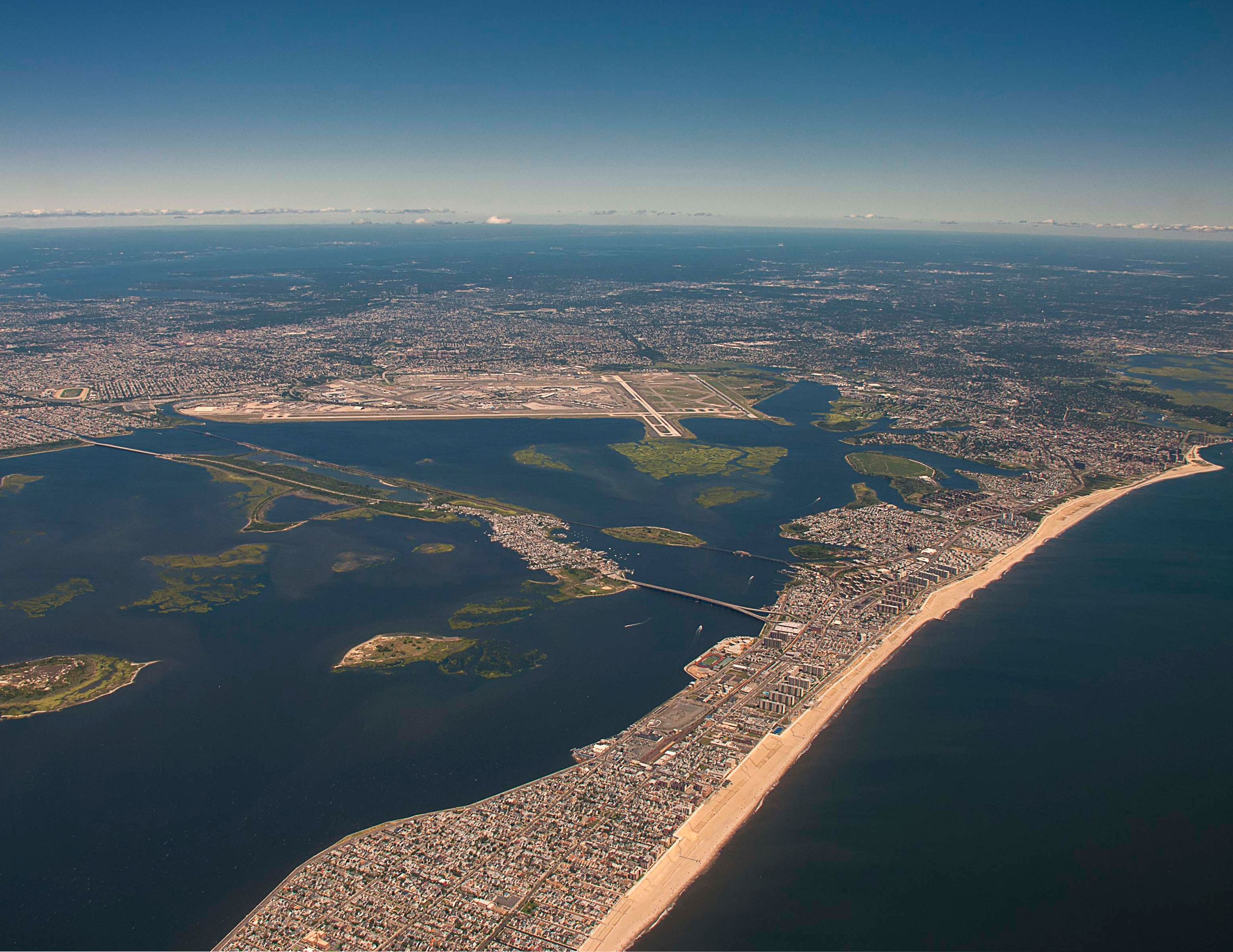 The Rockaway peninsula in Queens, New York from the air separating Jamaica Bay from the Atlantic Ocean